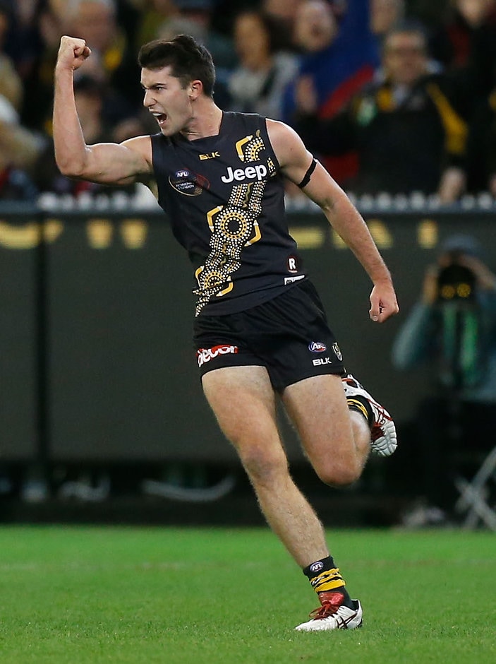 AFL 2015 Rd 09 - Richmond v Essendon Corey Ellis of the Tigers celebrates a goal during the 2015 AFL Round 09 Dreamtime at the G match between Richmond Tigers and the Essendon Bombers at the MCG, Melbourne on May 30, 2015. (Photo: Adam Trafford/AFL Media)